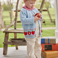 Little English classic toddler unisex light blue knit cardigan with apple pattern on bottom 