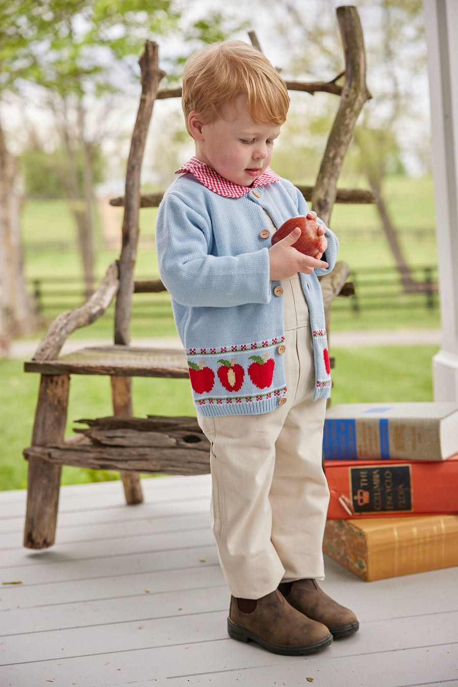Little English classic toddler unisex light blue knit cardigan with apple pattern on bottom 