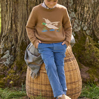 Little English traditional children's clothing. Chestnut brown Intarsia Sweater with flying mallard motif for boys layered over khaki gingham button down shirt and stormy blue corduroy classic pants. 