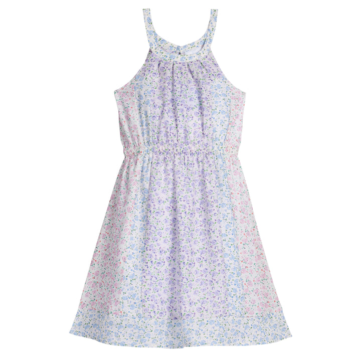 Little English girl's flowy floral dress for spring with halter neck