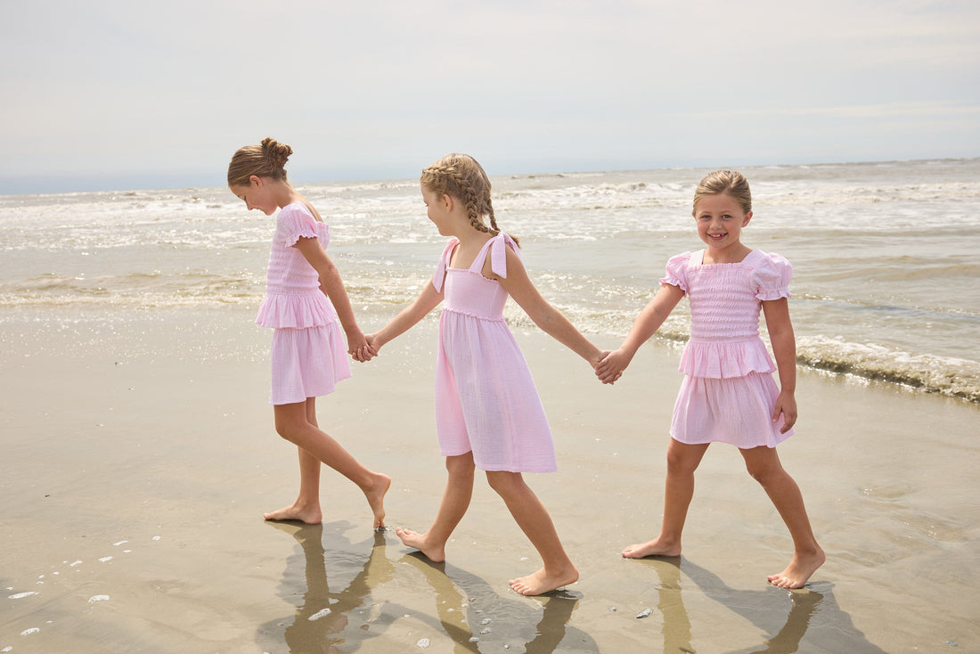 Little English classic isla top in jaipur pink with smocked details, isla skirt in jaipur pink, Leela dress with tie shoulders in jaipur pink, for little girls