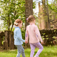 Little English traditional children's clothing.  Long sleeve Hastings polo in light pink with ruffle collar and purple floral detailing. Paired with Purple floral leggings for little girls.  Light blue Hastings polo with green floral detail paired with green floral leggings.