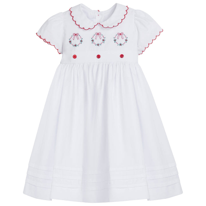 little english classic childrens clothing girls white dress with peter pan collar and red trim with wreath and red button detail