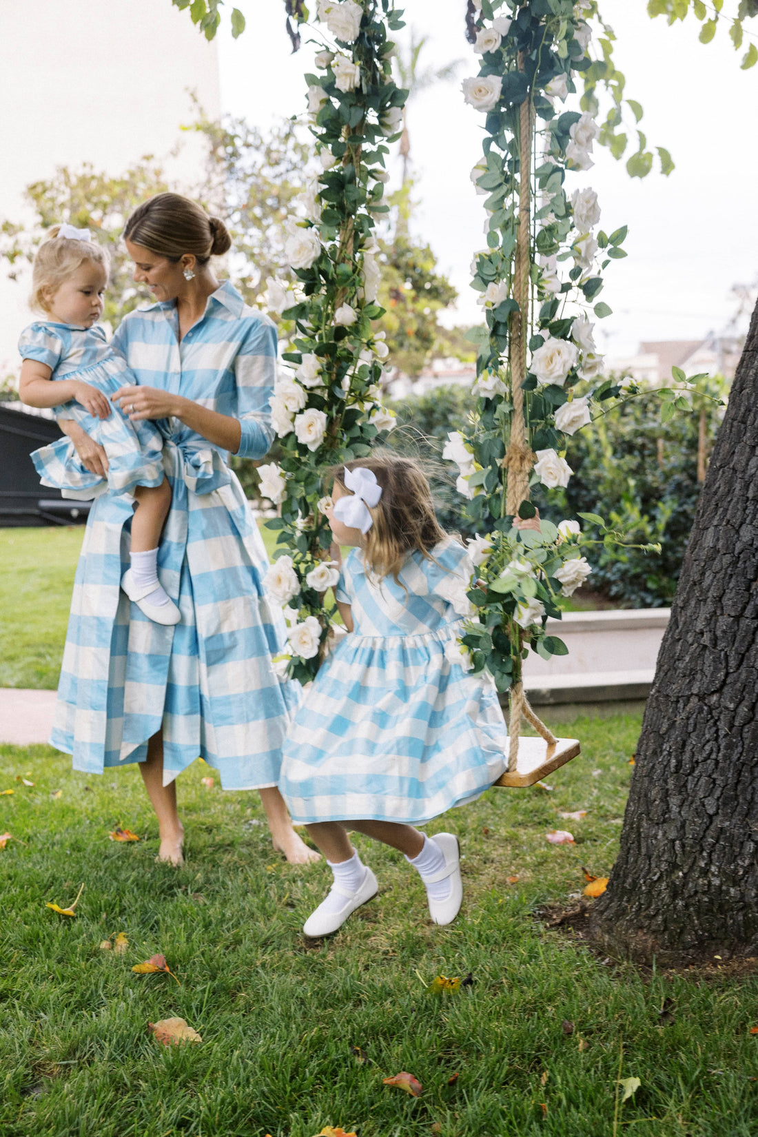 Little English X Luciana Emilia Capsule Collection special occasion dress for little girls.  Formal dress in 100% silk blue check with peter pan collar and capped sleeves