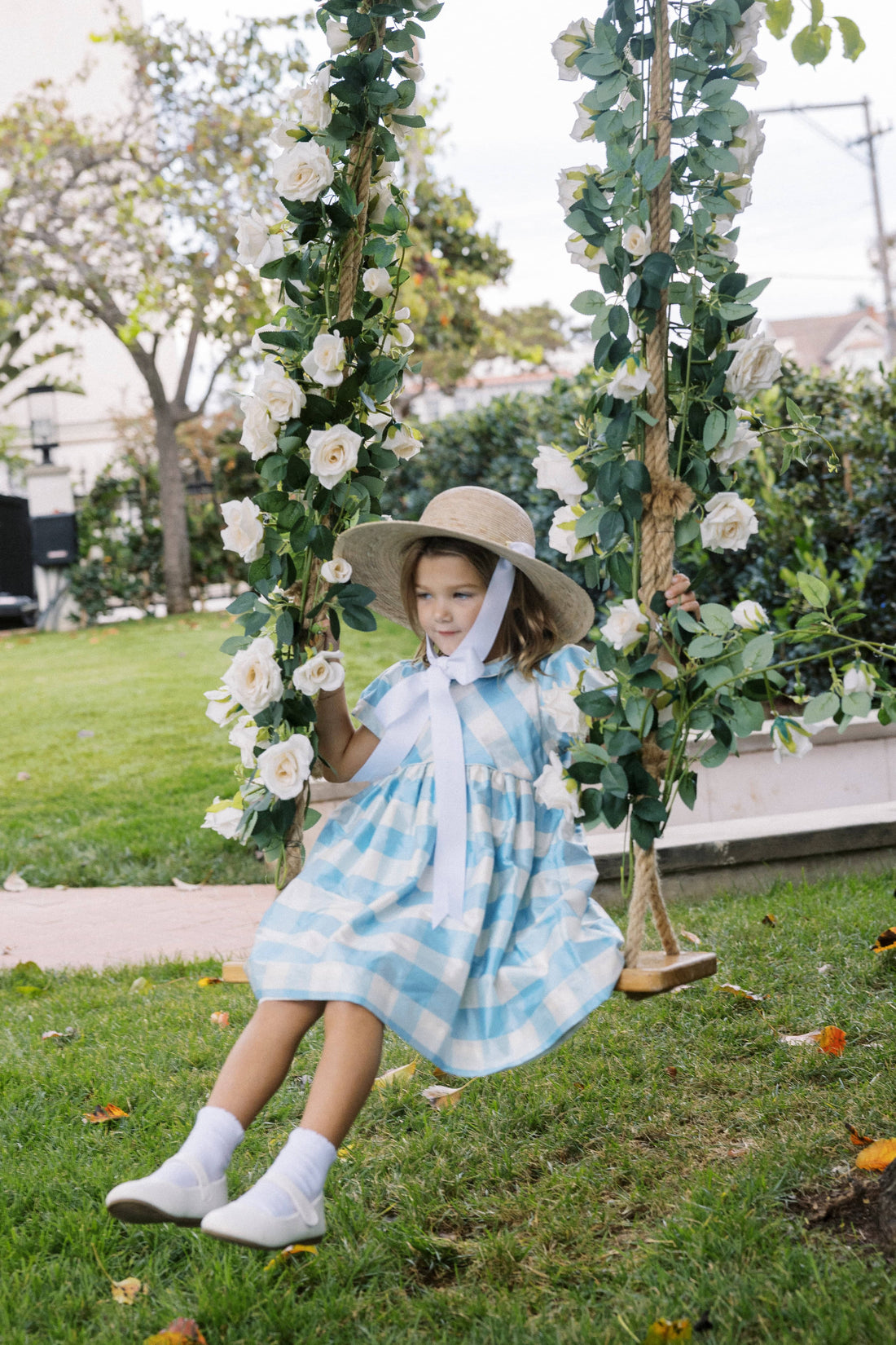 Little English X Luciana Emilia Capsule Collection special occasion dress for little girls.  Formal dress in 100% silk blue check with peter pan collar and capped sleeves