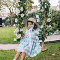 Little English X Luciana Emilia Capsule Collection special occasion dress for little girls.  Formal dress in 100% silk blue check with peter pan collar and capped sleeves