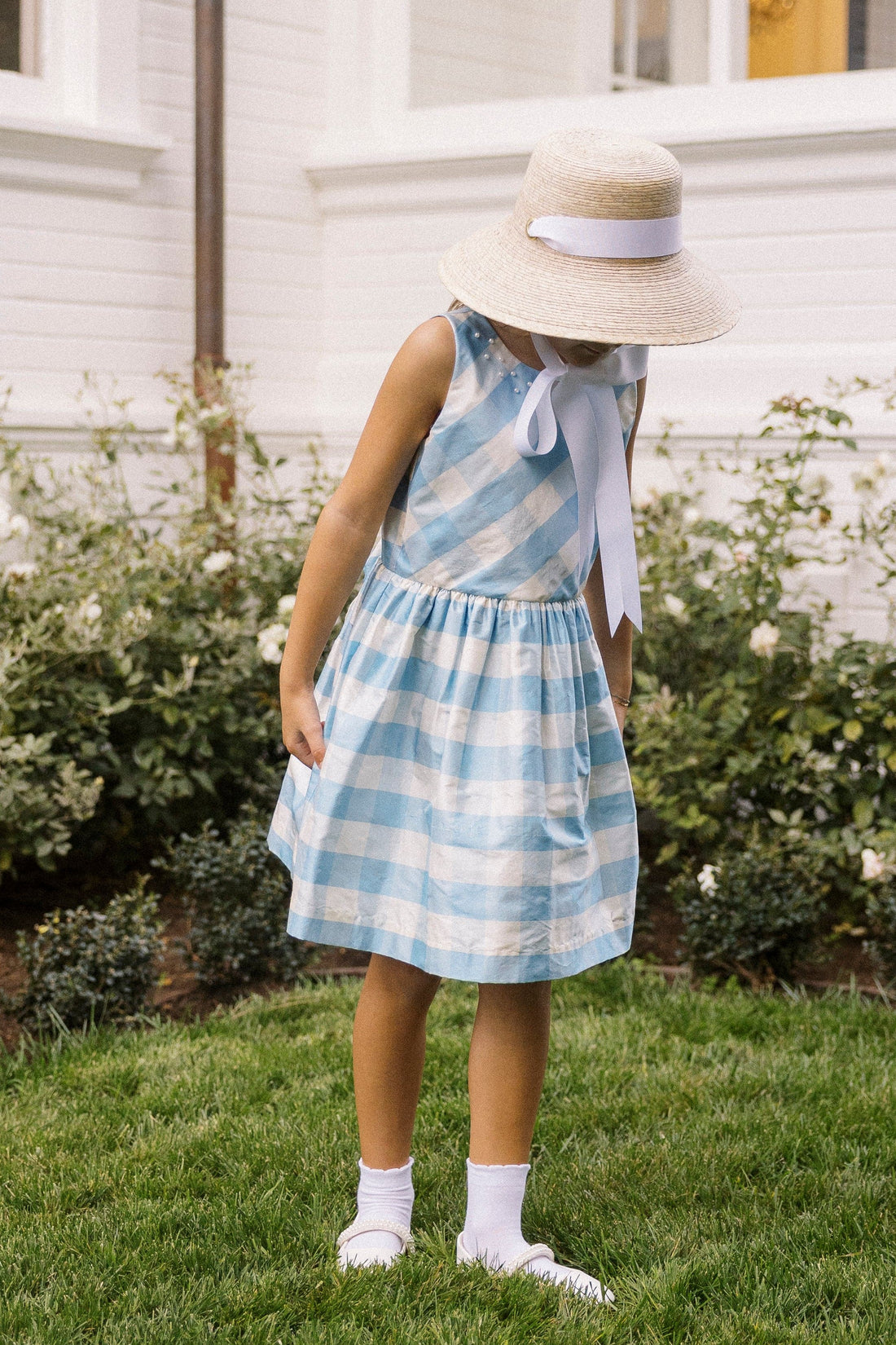 Heirloom quality, 100% silk, sleeveless light blue check formal dress with pearl details at neckline.  Little English X Luciana Emilia capsule collection special occasion dress for girls.