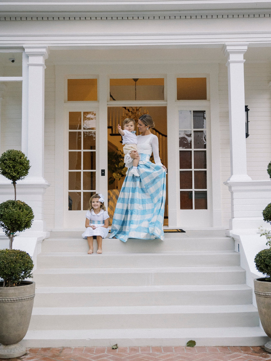 Little English X Luciana Emilia capsule collection bow sash in 100% silk blue check.  Special occasion dress accessory for girls paired with white peter pan formal dress