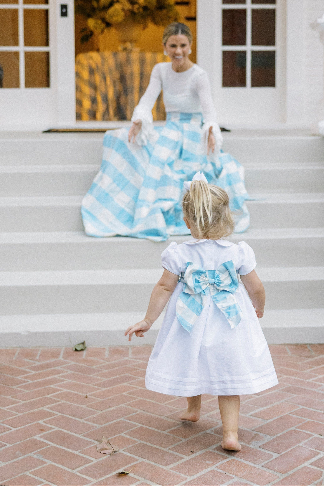 Little English X Luciana Emilia capsule collection bow sash in 100% silk blue check.  Special occasion dress accessory for girls paired with white peter pan formal dress
