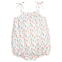 Little English traditional children's clothing.  White bubble with red and pink tulip print and fixed bow straps for baby girls