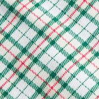 Little English traditional children's clothing. Green, red, and cream Mistletoe Tartan flannel fabric swatch