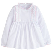 little english classic childrens clothing girls white blouse with ruffles on the chest, neckline, and sleeves with pink detail