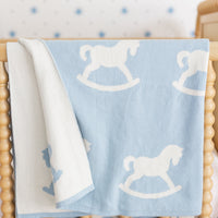 little english classic children's clothing baby boys blue and cream nursery blanket with all around rocking horse motif