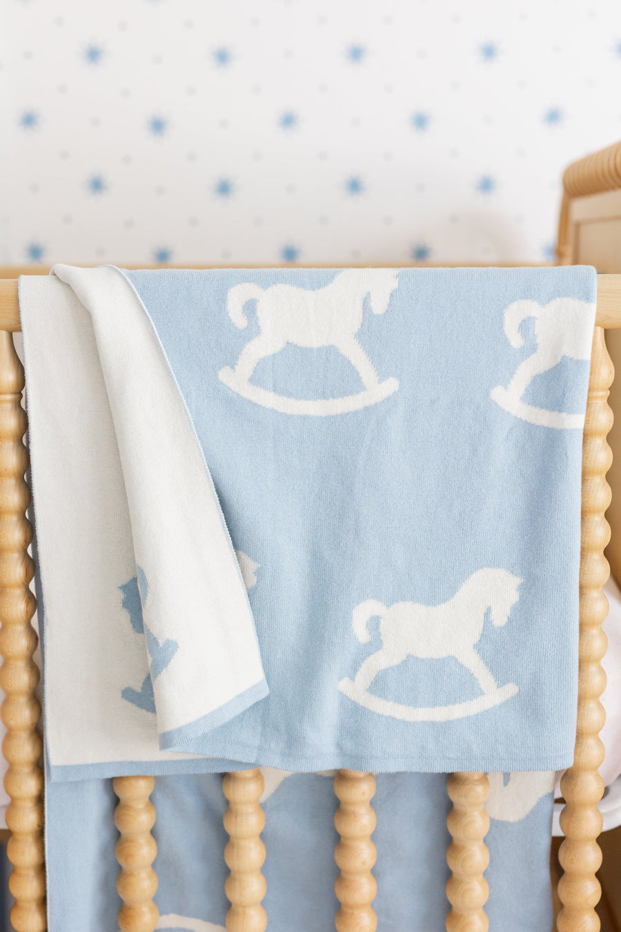 little english classic children's clothing baby boys blue and cream nursery blanket with all around rocking horse motif