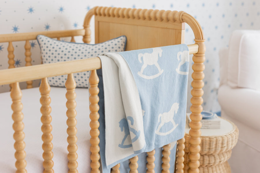 little english classic children's clothing baby boys blue and cream nursery blanket with all around rocking horse motif, Pima crib sheet in blue micro dot pattern