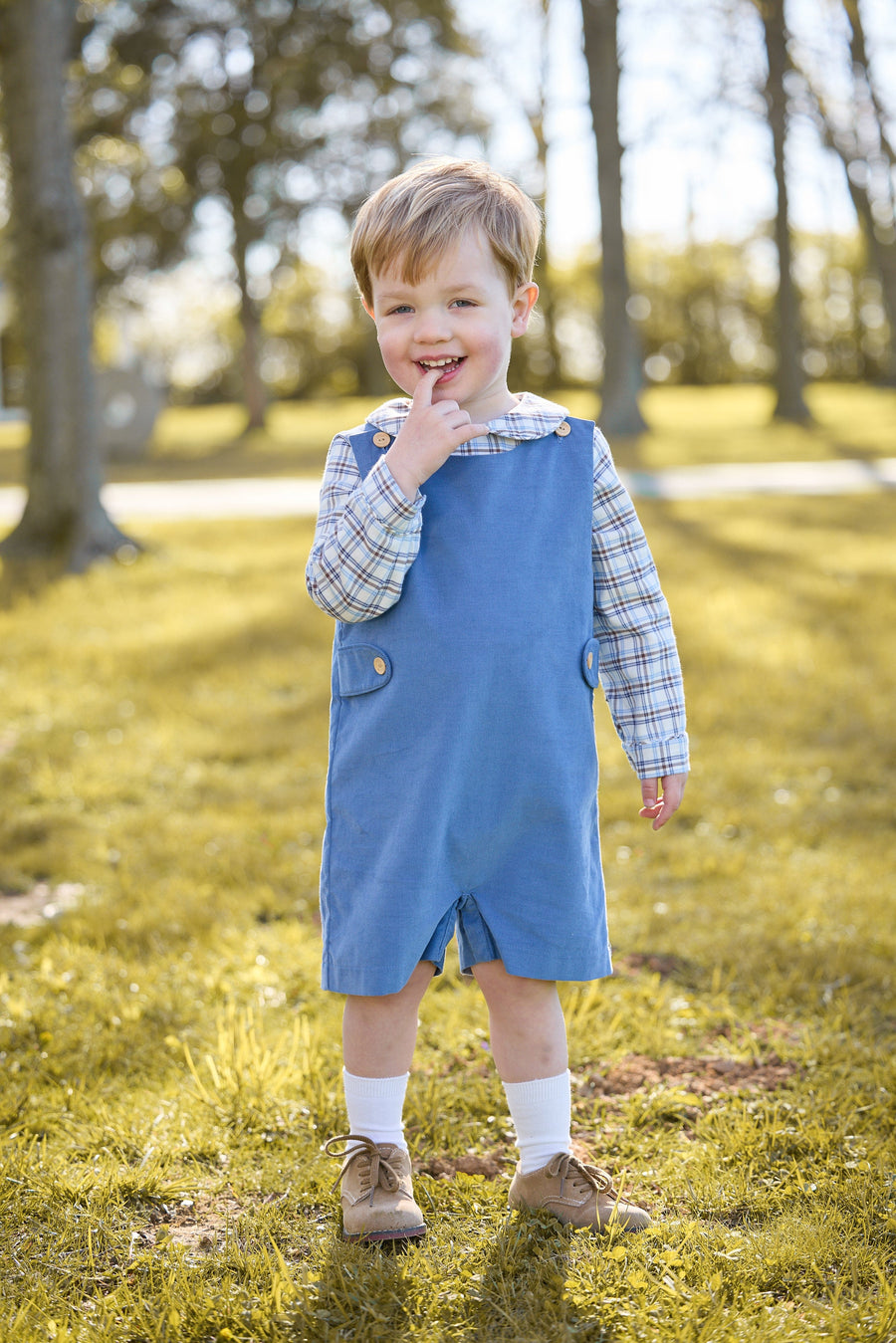 little english classic children's clothing peter pan collar long sleeve shirt in light blue, cream, and brown plaid, button tab john john in stormy blue, fall outfits for boys
