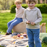 Little English traditional children's clothing.  Tan and blue Durham Windowpane peter pan shirt for toddler boys paired with stormy blue corduroy pull on pants.