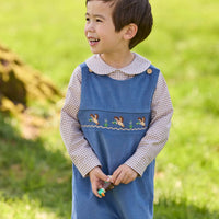 Little English traditional children's clothing.  Khaki Gingham peter pan shirt for toddler boys paired with stormy blue corduroy john john with flying mallard smocking across chest. 