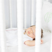 Little English traditional children's clothing.  Girl lab applique white knit set with short sleeve top and diaper cover for baby girls with light pink trim 