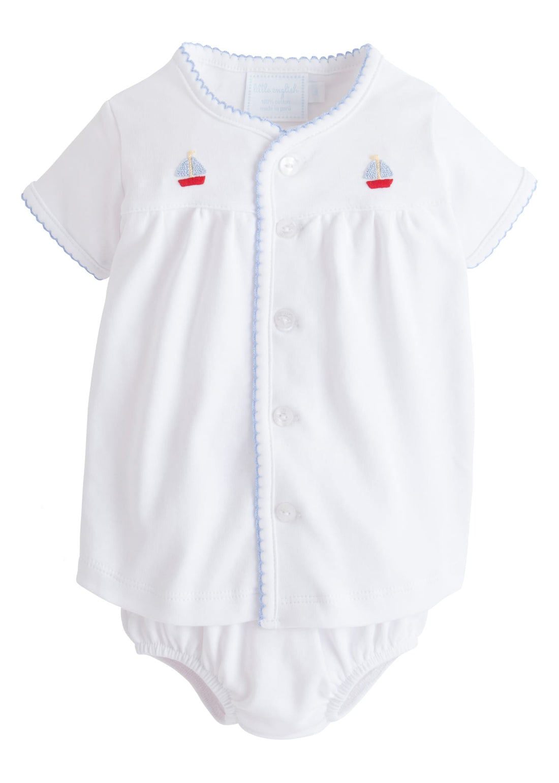 Little English traditional baby clothing.  Classic white pima cotton set with blue and red sailboat embroidery and light blue picot trim for baby boy
