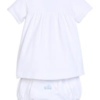 Little English traditional children's clothing.  White pima cotton newborn set with blue train pinpoint embroidery for baby boys.