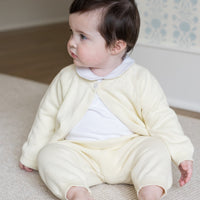 Little English traditional children's clothing. Long sleeve and long pant cream pointelle sweater set accompanied by a picot peter pan onesie in white for baby.