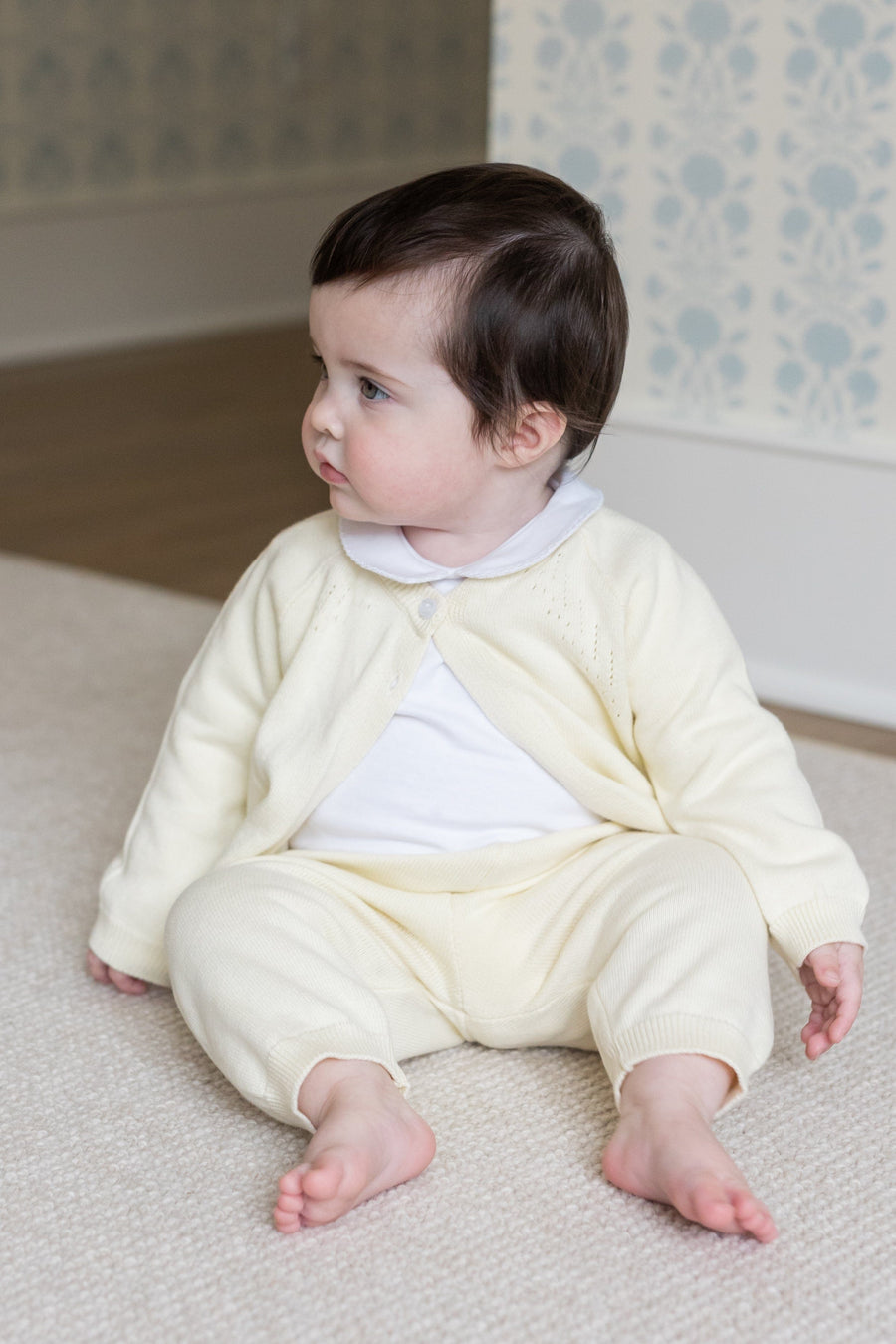 Little English traditional children's clothing. Long sleeve and long pant cream pointelle sweater set accompanied by a picot peter pan onesie in white for baby.