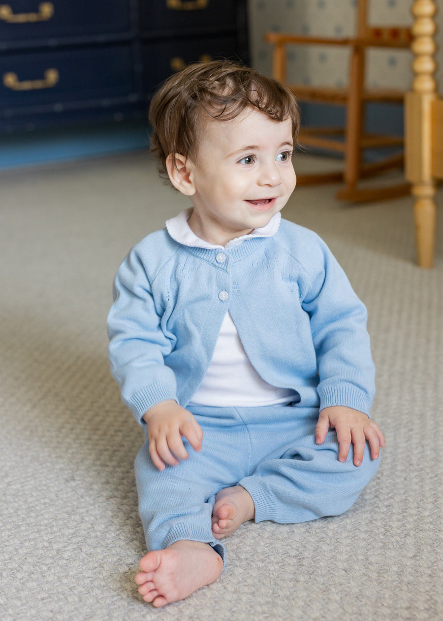 Little English traditional children's clothing. Long sleeve and long pant light blue pointelle sweater set accompanied by a picot peter pan onesie in white for baby.