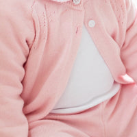 Little English traditional children's clothing. Long sleeve and long pant light pink pointelle sweater set accompanied by a picot peter pan onesie with light pink trim for baby girl