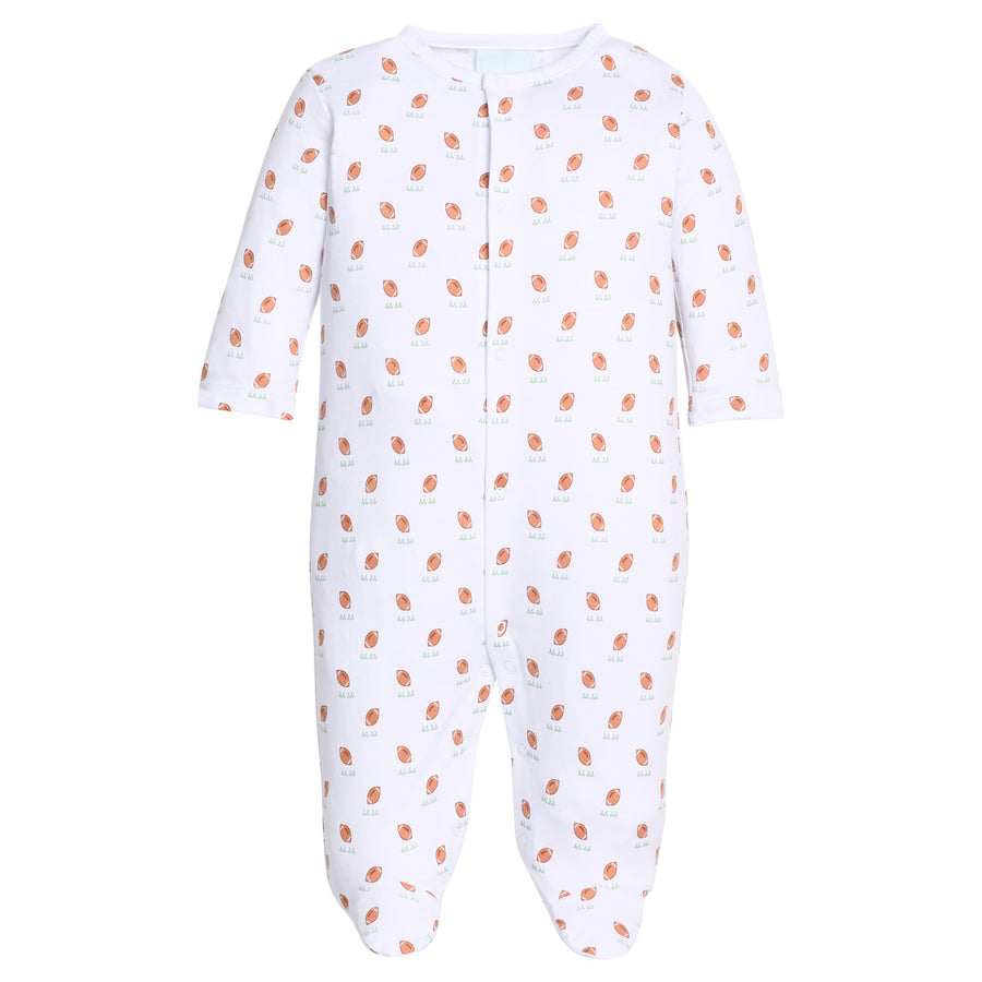 Little English traditional children's clothing.  White pima cotton footie with football print for baby boys