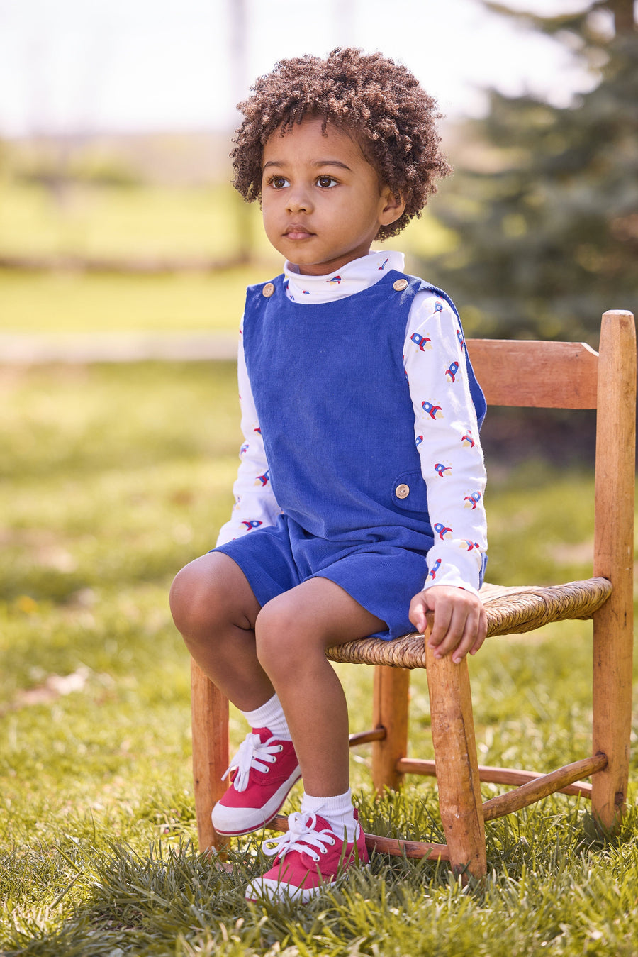 little english classic children's clothing white turtleneck with blue and red rocket print, button tab john john in royal blue corduroy, fall outfit for boy 