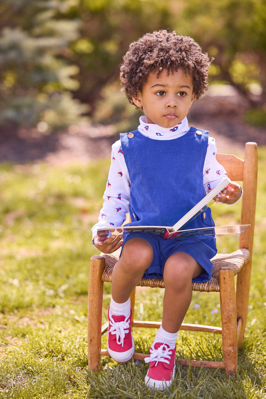 little english classic children's clothing white turtleneck with blue and red rocket print, button tab john john in royal blue corduroy, fall outfit for boy 