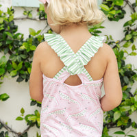 Little English traditional children's clothing. Pink swimsuit with green striped ruffled top and alligator pattern for little girls
