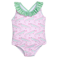 Little English traditional children's clothing. Pink swimsuit with green striped ruffled top and alligator pattern for little girls