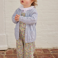 little english classic childrens clothing baby girls floral overall with ruffle detail on the chest and leg