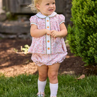 Little English classic children's clothing.  Pink and green floral set for baby girls.  Puff sleeve top with white peter pan collar and placket with pumpkin embroidery paired with matching ruffled bloomer.