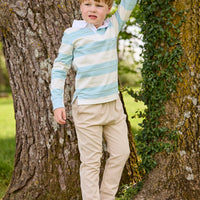 Little English traditional children's clothing.  Cream, aqua and green rugby polo paired with tapered khaki sport pant for little boys.