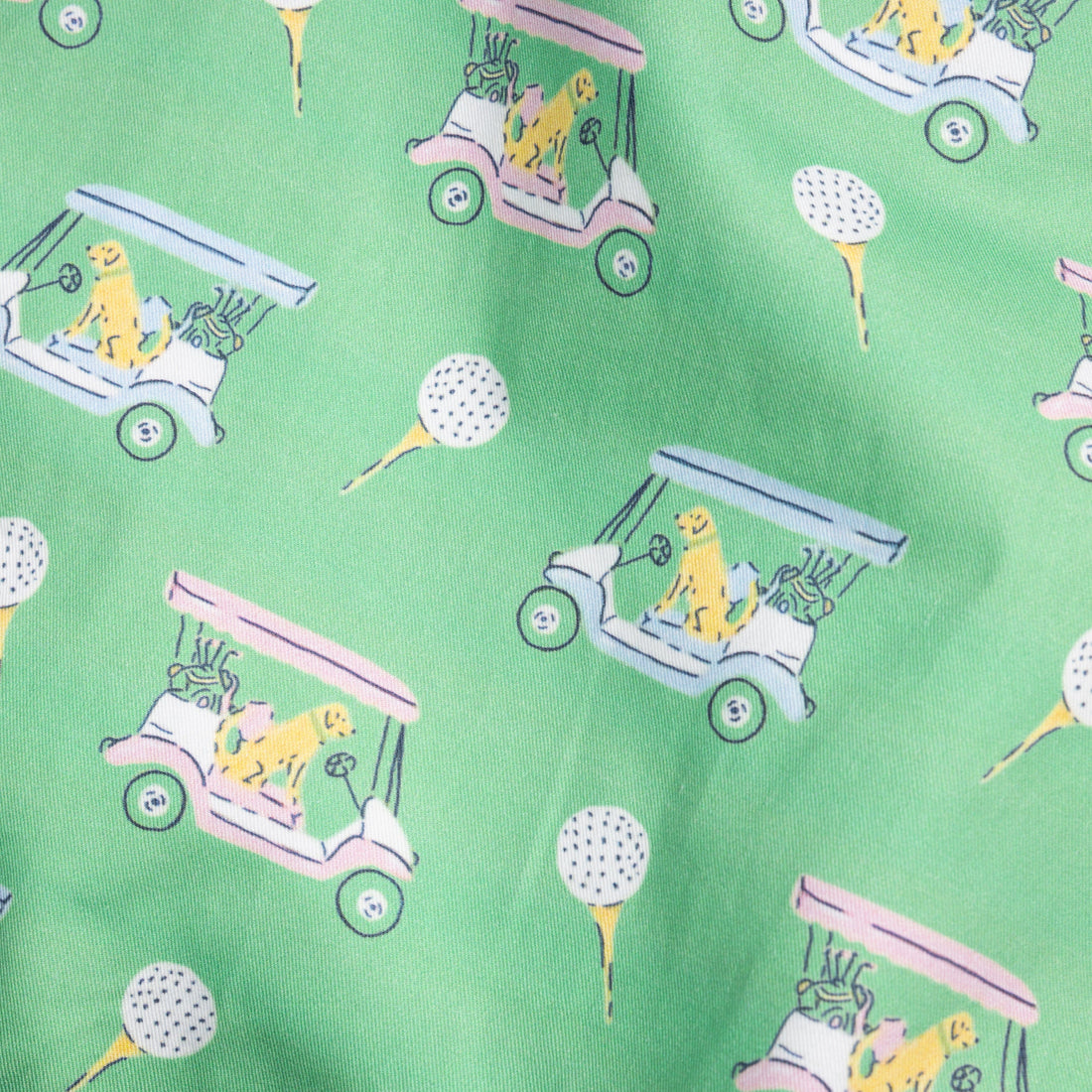 Little English printed twill fabric for spring, green fabric with pink and blue golf carts with yellow labs and golf balls