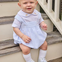 Little English traditional children's clothing.  Traditional two-piece bubble set for baby boys with with peter pan short sleeve shirt with embroidered bunnies at the collar and coordinating bubble in light blue stripe seersucker fabric.  Easter outfit for baby boys.