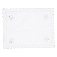 Little English traditional children's clothing.  White cotton scallop baby pillowcase with light blue trim and floral embroidery at the corners