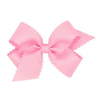 Little English traditional children's clothing.  Girl's pink scallop edged hair bow for Spring