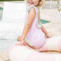 Little English traditional children's clothing. Pink striped swimsuit with scoop back and green striped ruffle details for little girls