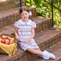 Little English classic children's clothing.  Short sleeve white knit peter pan dress with school themed print.  Back to school outfit for little girls.
