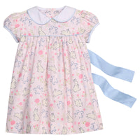 Little English traditional children's clothing.  Classic peter pan dress with capped sleeves and a light blue sash in a light pink bunny print for little girls.  Easter outfit for girls.