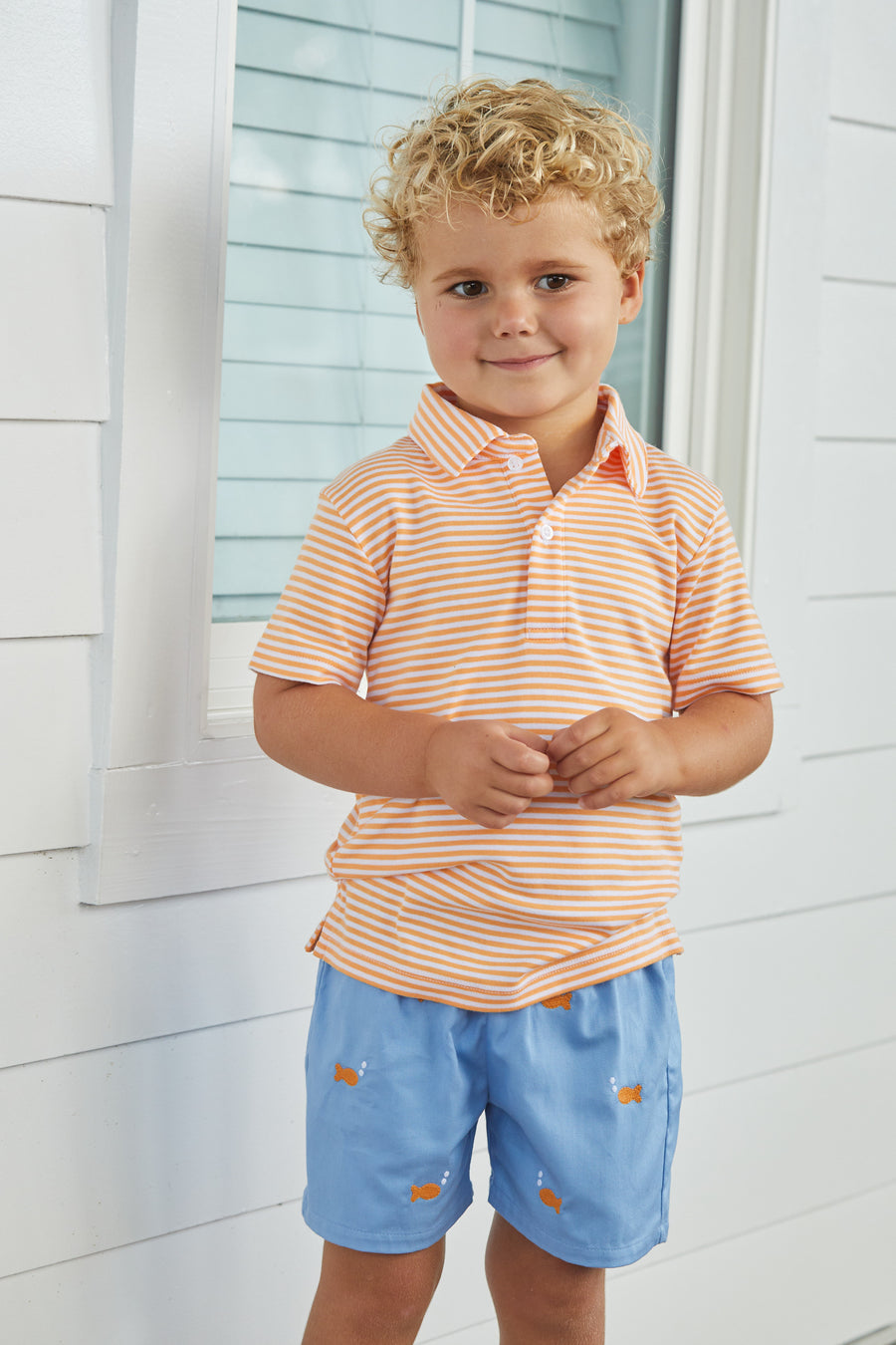 Little English boy's spring light blue twill shorts with embroidered gold fish
