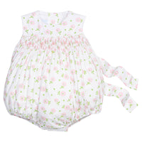 Little English traditional children's clothing.  White sleeveless smocked bubble with pink and green florals for baby girls