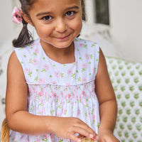 Little English traditional children's clothing.  White sleeveless smocked dress with pink and green florals for little girls