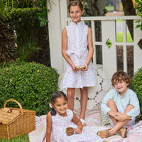 Little English traditional children's clothing.  Classic sleeveless button down dress in pink and green floral for older girls