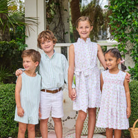 Little English traditional children's clothing.  White sleeveless smocked dress with pink and green florals for little girls