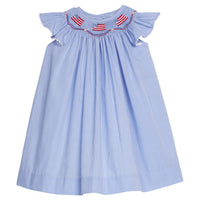 Little English traditional children's clothing. Flutter sleeve dress for toddler girls in royal blue mini gingham with smocking at the collar and American flag bunting